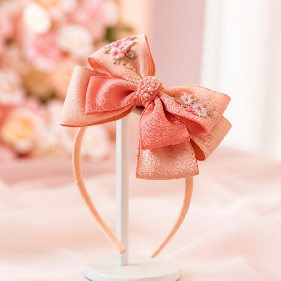 Laço pêssego com detalhe floral